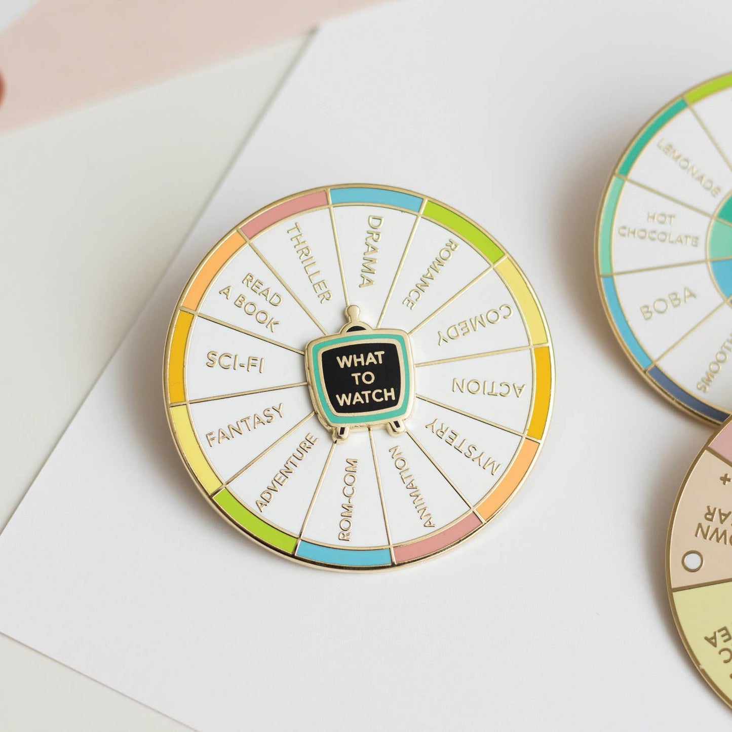 What To Watch Spinning Enamel Pin, Interactive Pin